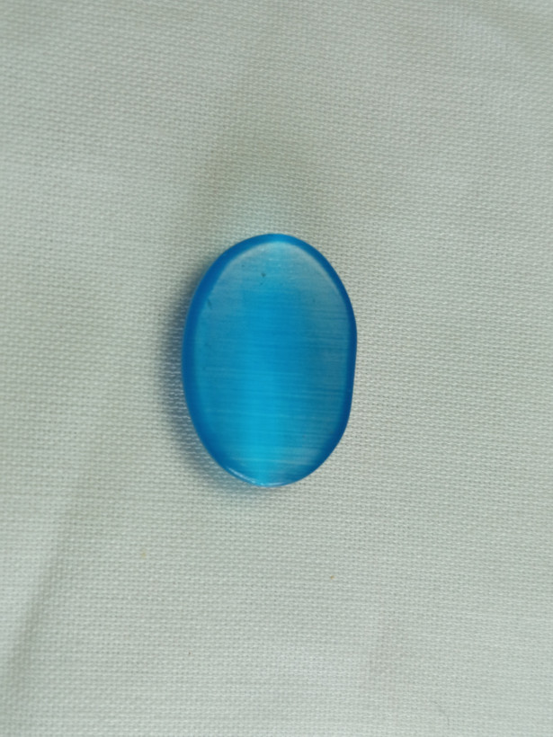 نگین چشم گربه ابی رنگ بیضی شکل