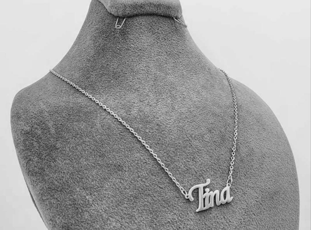 گردن بند نقره مدل اسم تینا به لاتین Tina متصل به زنجیر نقره عیار 925